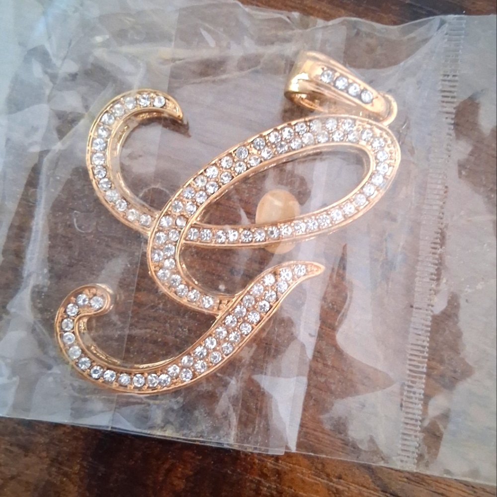 Elegant Gold and Silver Crystal Pendant